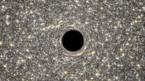 Hallan MicroGalaxia con Agujero Negro Gigante en su Centro