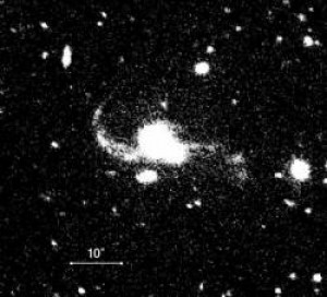 Detección de un Cuásar Binario Dentro de un Par de Galaxias en Plena Fusión